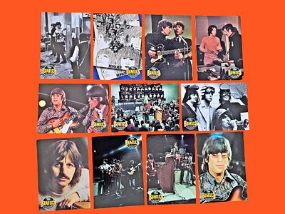 A collection of trading cards from The Beatles from The River Group series, published in 1993. T 