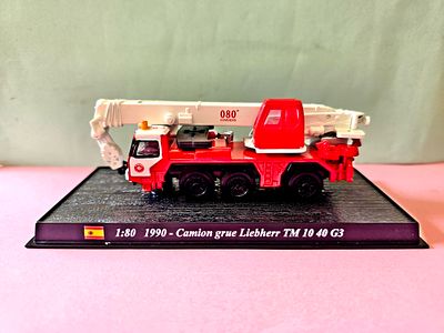 A collectible metal model of a 1990 Liebherr TM 10 40 G3 fire crane truck, manufactured by Del 