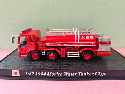 A collectible metal model (Die-Cast) of a 1984 Japanese Morita Water Tanker I Type fire truck 