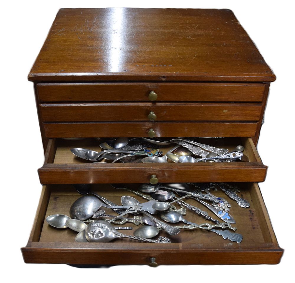 Lot 134: Ten Drawer Cabinet With Silver