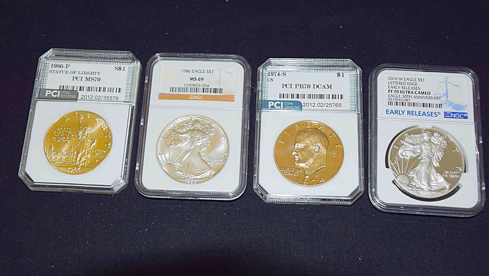 Lot 201: 4  Silver Dollars