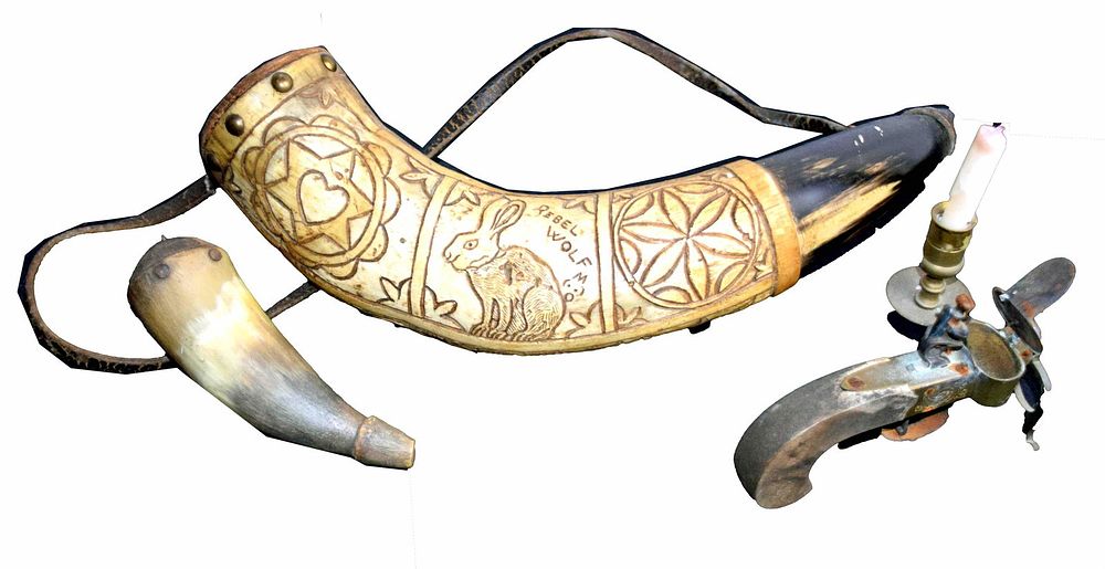 Lot 157: Two powder horns and lighter