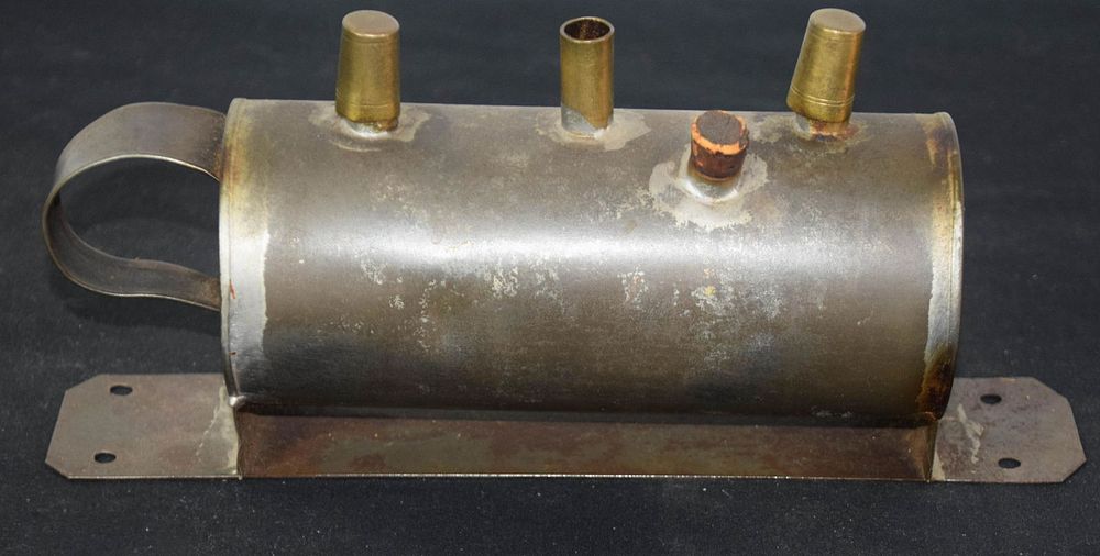 Lot 230: Tin Pig Lamp