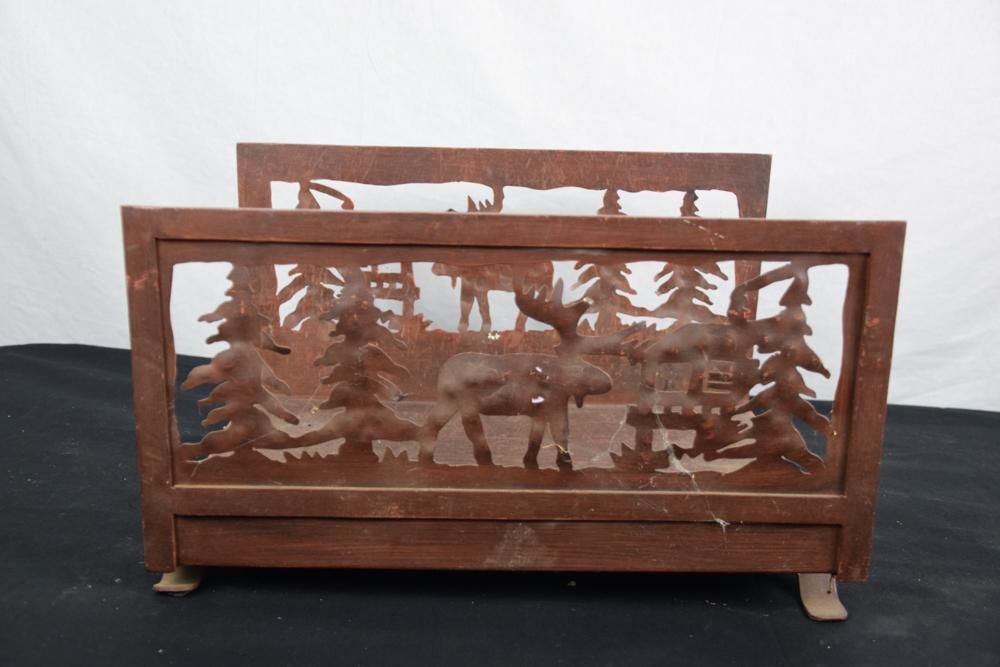 Lot 276: Decorated Cut-Steel Log Holder