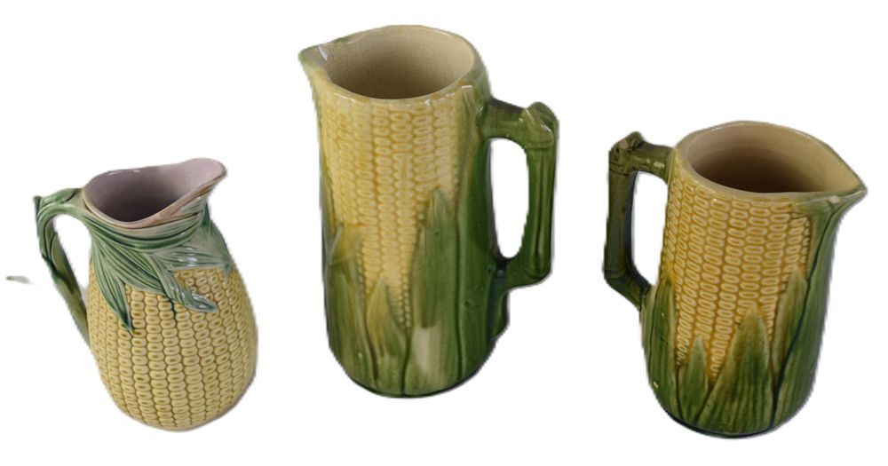 Lot 159: Three Majolica Corn Design Pitchers