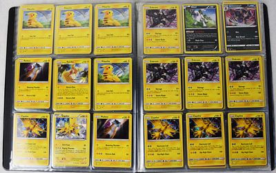 Three Pokémon Binders With Cards. Approximately 60 pages of 9 cards each in three Pokémon 