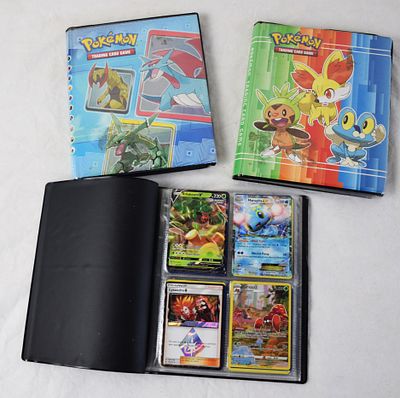 Three Pokémon Binders With Cards. Approximately 60 pages of 4 cards each in three Pokémon 