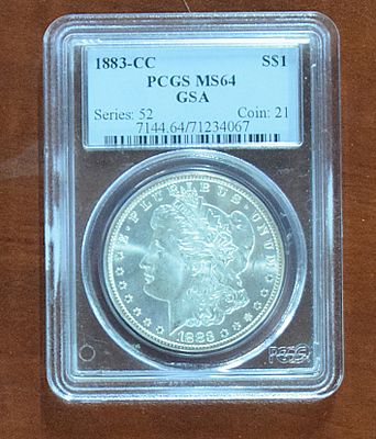 1883 Carson City Morgan Dollar. Near mint MS64 graded 1883 Carson City Morgan silver dollar.