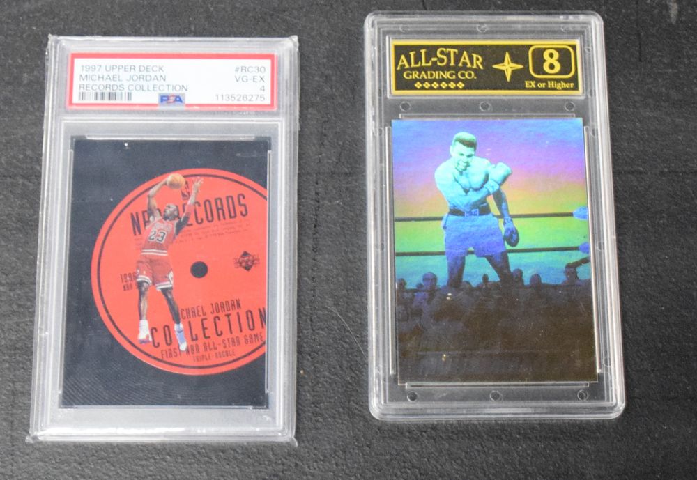 Lot 147: Michael Jordan/ Mohamad Ali Graded Cards