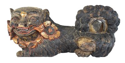 Large Wooden Reclining Foo Dog. A large well carved, reclining wooden Foo Dog with gilt wood 