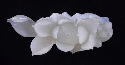 Jade Flower Carving. Jade flower carving on a base. Dimensions: 1.5" H x 3.5" W