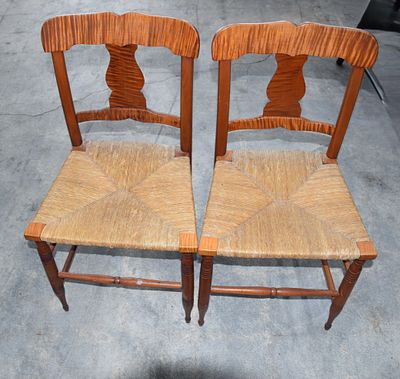 Pair of Tiger Mable Chairs. A pair of two tiger maple chairs with rush seats. Tiger maple has a 