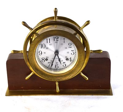 Seth Thomas Ship Clock. Vintage Seth Thomas ships clock with ship wheel design, metal dial with 
