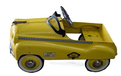 Vintage Style Yellow Cab Pedal Car. A vintage 1950s style yellow child's taxi cab pedal car 