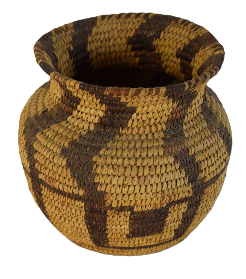 Lot 10: Western Apache coiled basketry olla—a jar-shaped storage basket—from Arizona or western New Mexico.