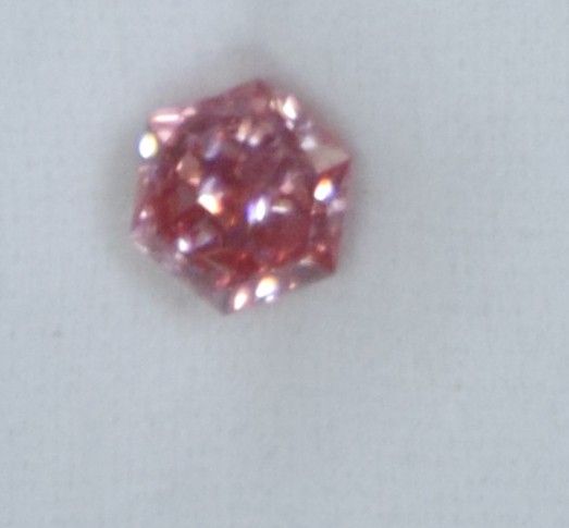 Lot 21: 5.11 Carat Fancy Vivid Pink Diamond VS2