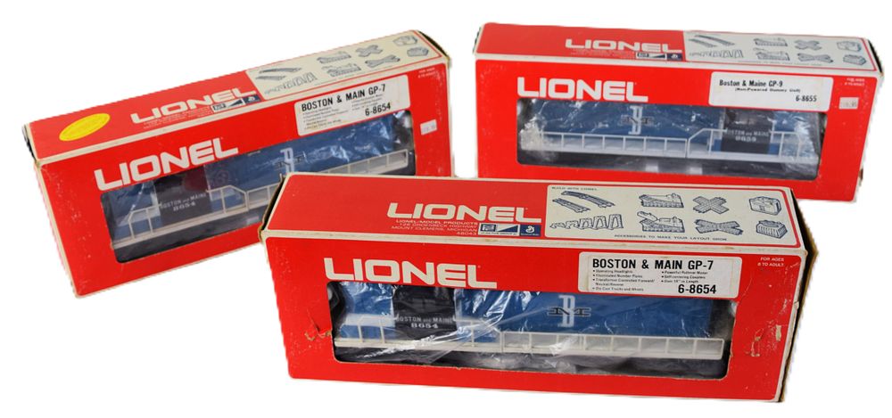 Lot 213: Three Antique Lionel GP-9 Bluebird Engines And Dummy