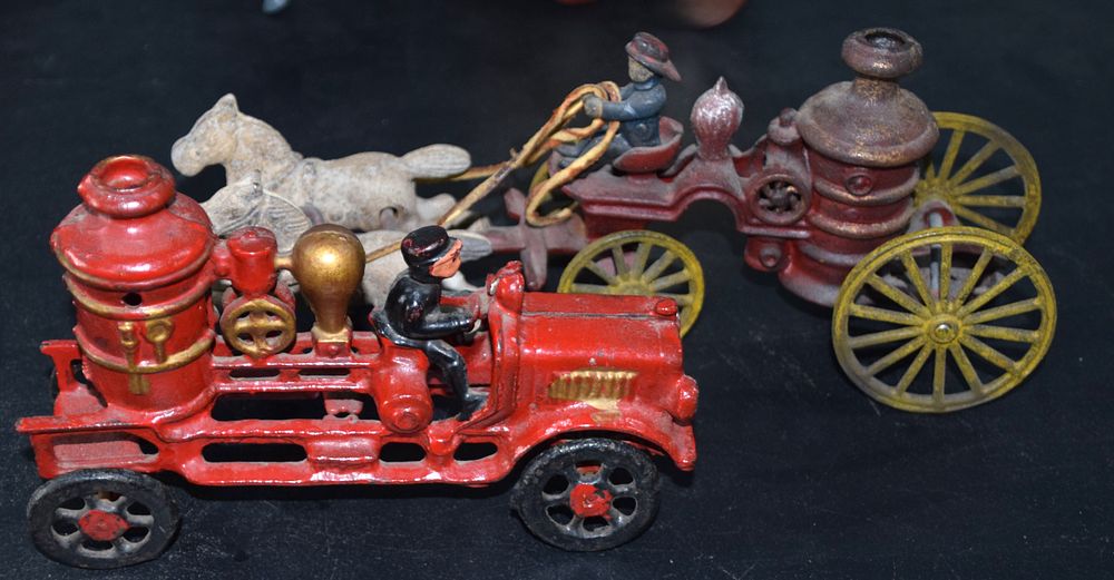 Lot 224: 2 Cast Iron Fire Pumper Toys