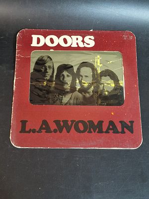 תקליט ויניל (LP) מקורי – הדלתות: The Doors – L.A. Woman (מהדורת חלון צלופן מקורית עם פינות 
