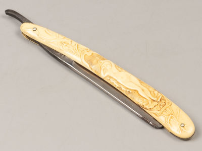 [Модерн] Опасная бритва. MUSSEL. Германия, нач. ХХ в. Кость, сталь, резьба, гравировка. . Размер 