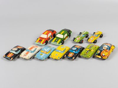Набор гоночных машинок. 11 шт. СССР, вт. пол. ХХ в. Жесть, печать, пластик. Машинка. Мальчик и 