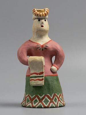Глиняная игрушка. Женщина с полотенцем. Каргопольский промысел. 1980-е гг. Каргопольский 