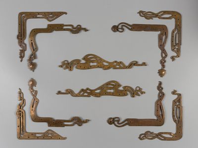 8 угловых накладок на раму или дверцу шкафа и две на замочную скважину в одном стиле. Начало ХХ 