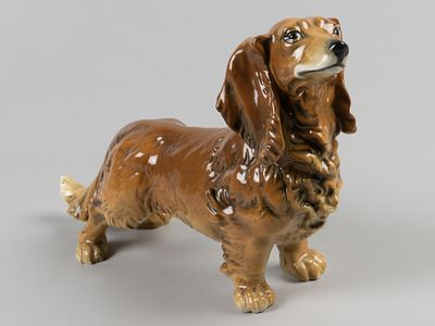 Статуэтка. Длинношерстная такса. Karl Ens. Германия, вт. пол. ХХ в. Фарфор, подглазурная роспись. 