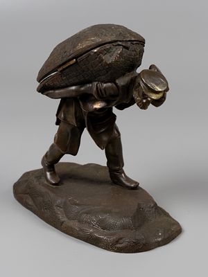 Статуэтка-шкатулка Носильщик. Часть настольного письменного прибора: марочница (?). Реплика по 