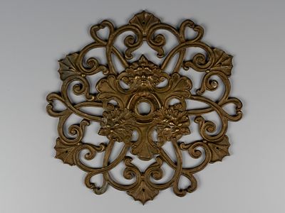 Накладка. Розетка с маскаронами. XIX в. Бронза. Диаметр 33 см. Следы бытования. В целом в 