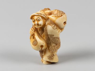Нэцкэ. Японская торговка. Япония, руб. XIX-XX вв. Слоновая кость, тонировки. Высота 4 см. На 