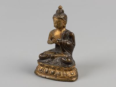 Статуэтка. Будда. XIX в. Бронза, позолота. Высота 10 см. Сквозные отверстия, растрескивания, на 