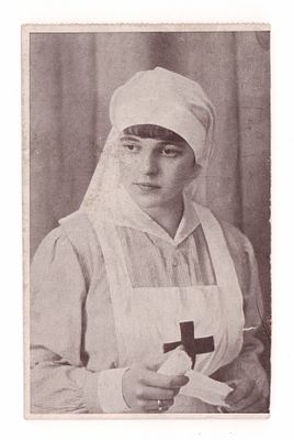 Сестра милосердия. Открытка периода I Мировой войны. С рекламой. Открыточный формат. Имеется 