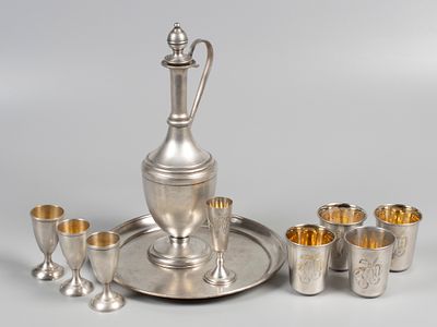 Питейный набор. 10 предм. СССР, 1950-е гг. Белый металл, штихель, позолота. Вес 843 г. Клейма 