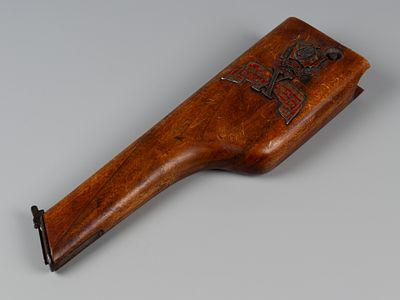 Кобура Mauser C-96 с накладкой &laquo;10 лет О.Г.П.У.&raquo;. 1920-е. Дерево, бел. металл, эмаль. Размер 