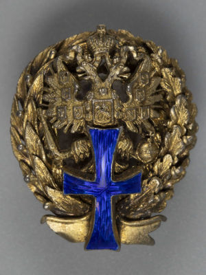 Фрачник. Знак об окончании Московского Коммерческого училища. Серебро 84 пр., позолота. Вес 10 