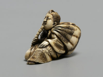 Нэцкэ. Дайкоку. Японец с мешком и трубкой. Слоновая кость, резьба. Подпись автора. Япония. Кон. 