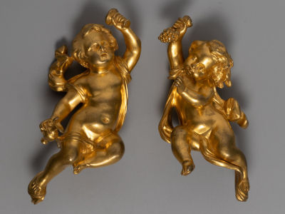 Бронзовые накладки (2 шт.) Путти. Бронза, золочение. Западная Европа. Середина XIХ в. Размеры 