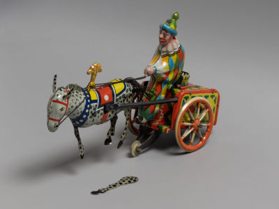 Заводная игрушка. Цирковой выезд. &laquo;Клоун в повозке на синей лошади с кисточкой&raquo; Жесть. ЛМЗ. 