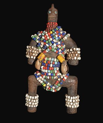 6 1/2" Namji Fertility Doll, Cameroon A hand-carved Namji fertility doll from Cameroon, richly 