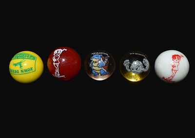1" Character and Advertising Glass Marble Group of 5 Description: Collection of five glass 