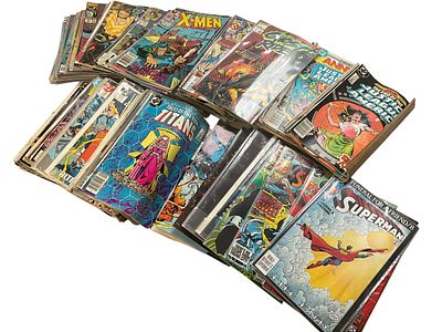 Comic Book Box Lot. Large tote full. Well over 75 comic books. Some in sleeves and some loose.