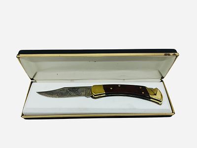 Buck 110U Harley Davidson Pocket Knife. Excellent condition in case. 187/3000. Total length is 