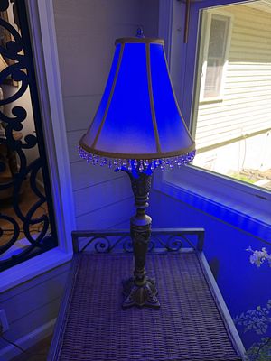 Table Lamp w/ Blacklight Bulb. Nice accent lamp with beaded fringe shade. Accompanied with a 