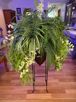 Plant Stand with Artificial Fern. Excellent condition. Plant stand measures 33 inches tall.