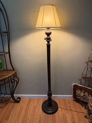 Vintage Wooden Floor Lamp. Great condition. Tested and works as it should. Stands 70 inches tall.