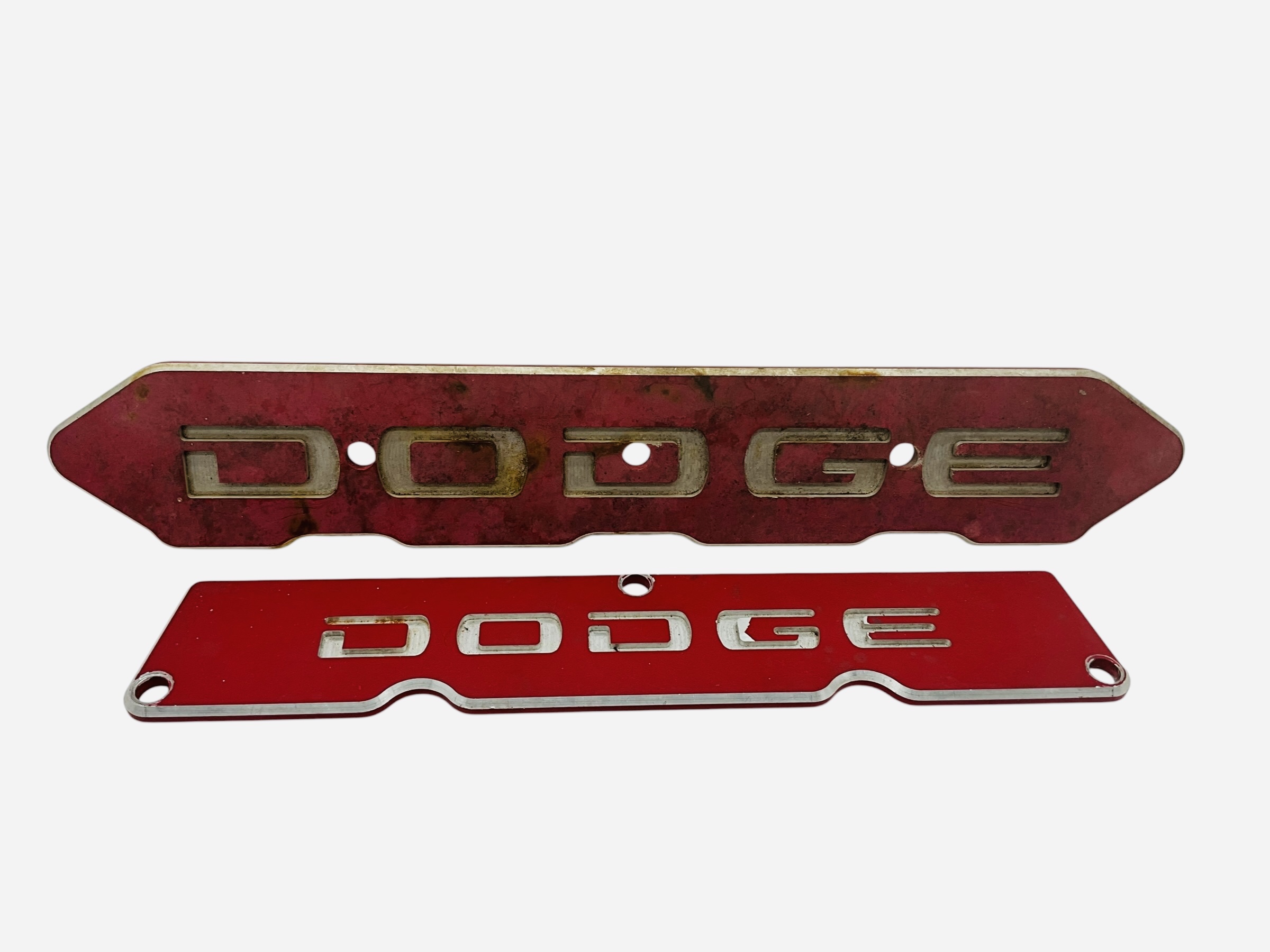 Two Vintage Metal Dodge Emblems