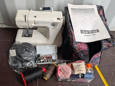 Janome Jem Gold Model 660 Sewing Machine and Assorted Accessories