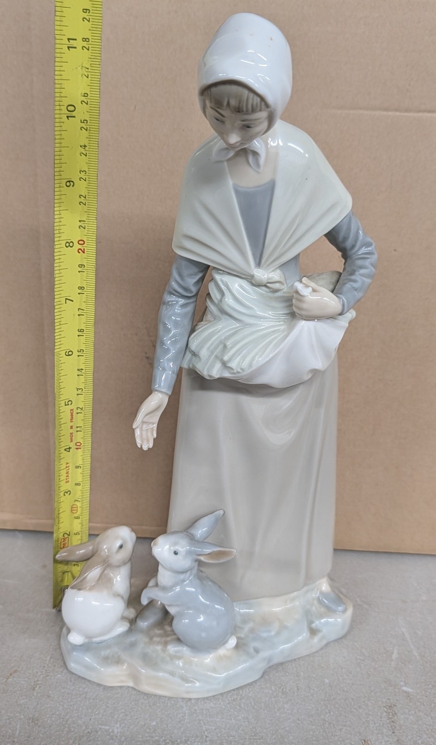 11.5" Large Nao Porcelain Figurine of a Woman with Rabbits