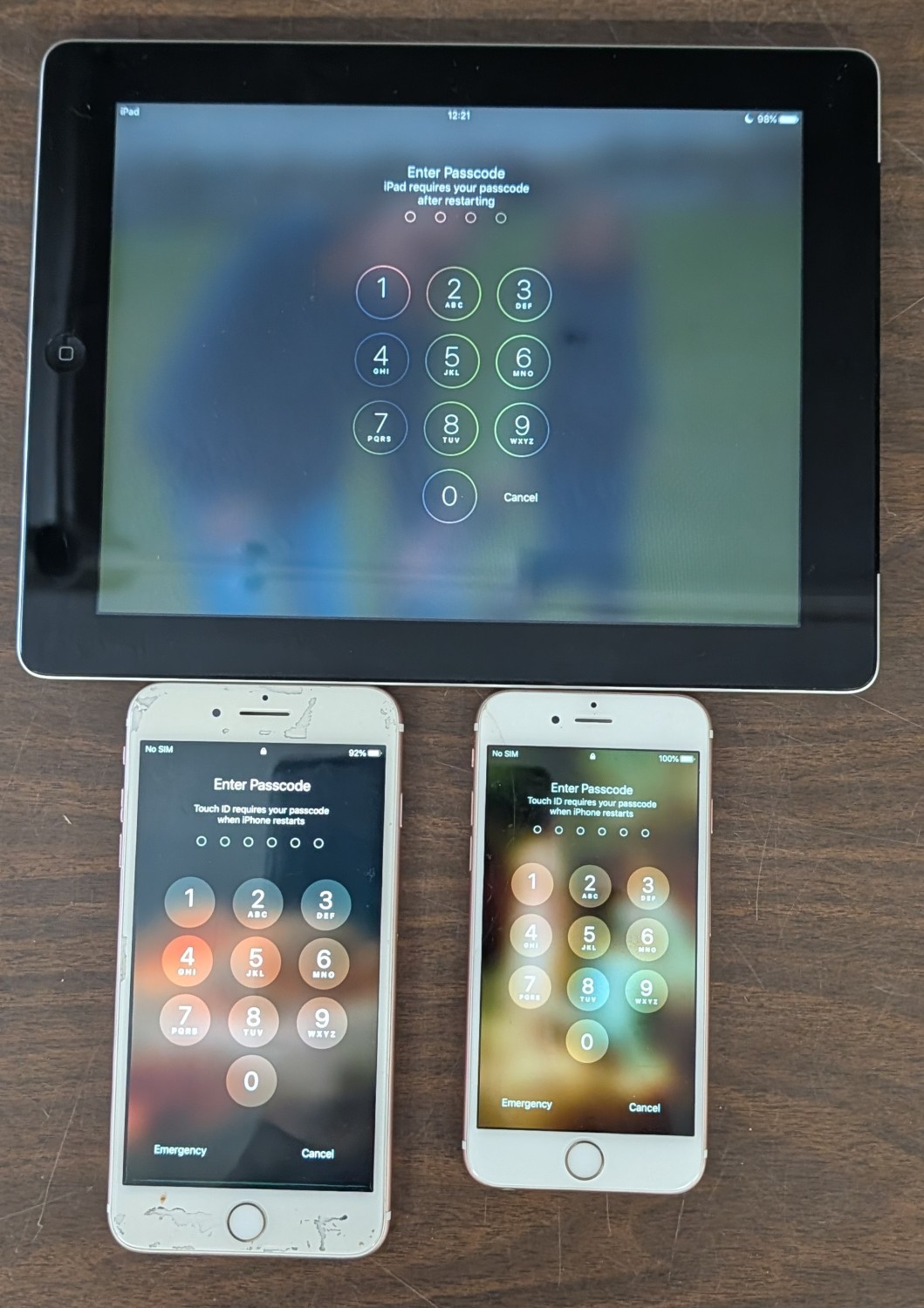 Three Apple Devices comprising an iPad 2 and two iPhones, All Password Protected